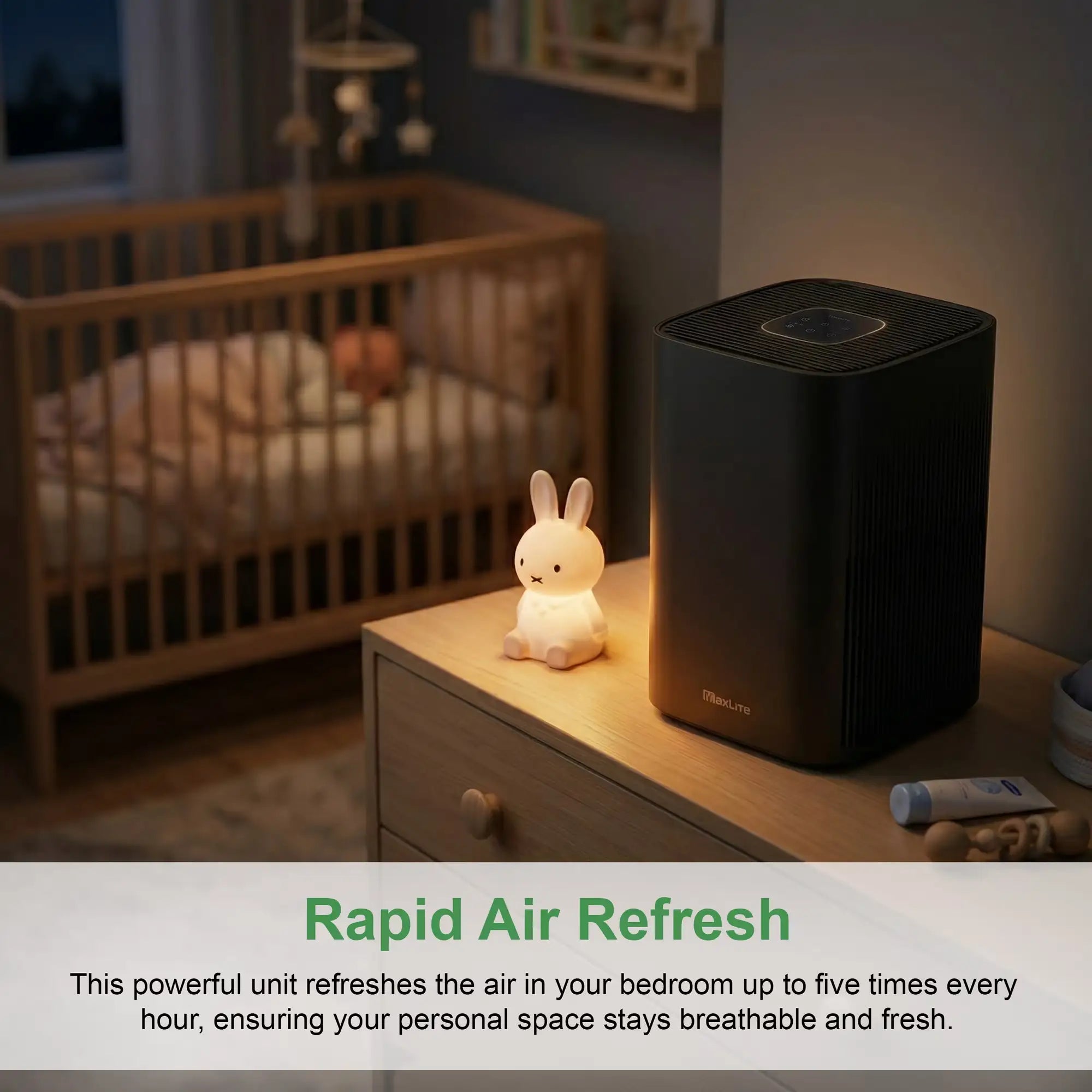 3-quarter low ambient lifestyle view of the CPM-MaxLite_AP215SF3B-air purifier on a dresser in a baby room next to a desktop nightlight.