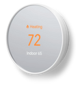 The Google Nest GGA02180US smart thermostat in white with a 72 degree heating readout on screen